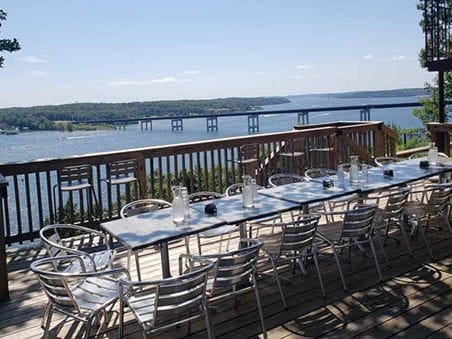 Deck tables overlooking the Lake of the Ozarks at Eagles Nest